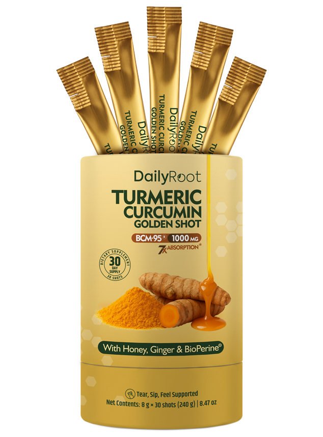 A DailyRoot golden shot sachet resting on linen beside fresh turmeric root, ginger and a spoon of honey